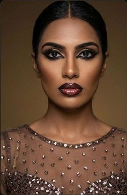 Engagement glam makeup with sequined dress